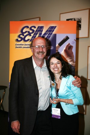 Dawn posing with her graduate supervisor, Dr. Bob Hancock, after winning the Cangene Gold Award for the best PhD thesis in Microbiology for 2005.